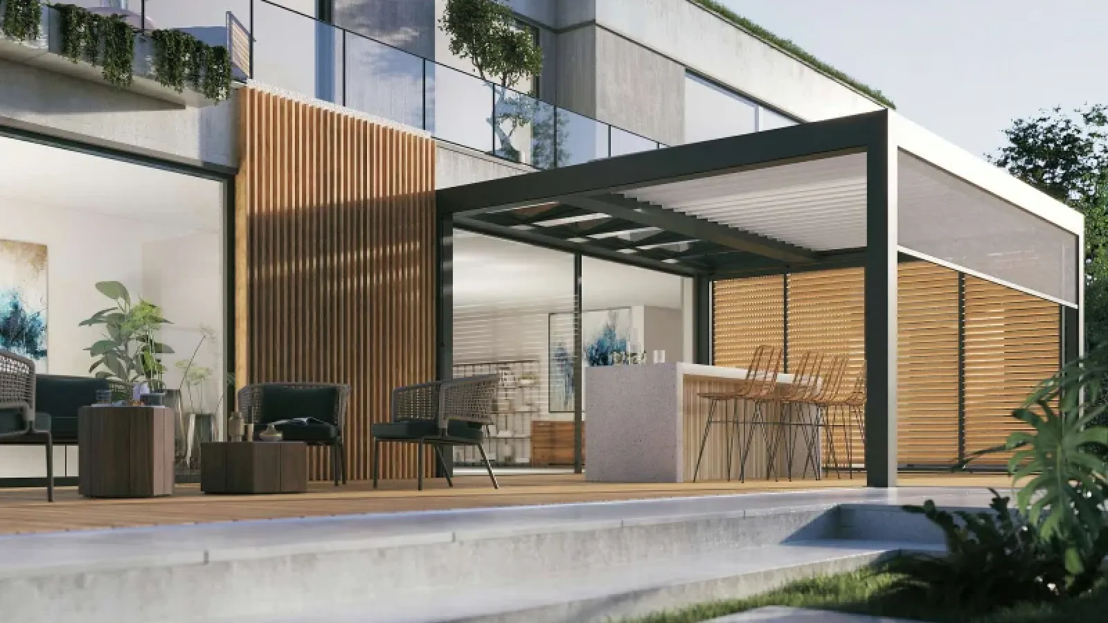 Vor einem großen Haus befindet sich eine dunkelgraue Terrassenüberdachung aus Alu und Glas mit einer Theke darunter.